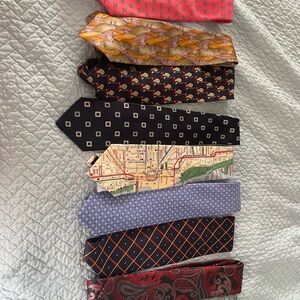 Lot of 9 men’s ties. Various colors and patterns.  All in good conditon.